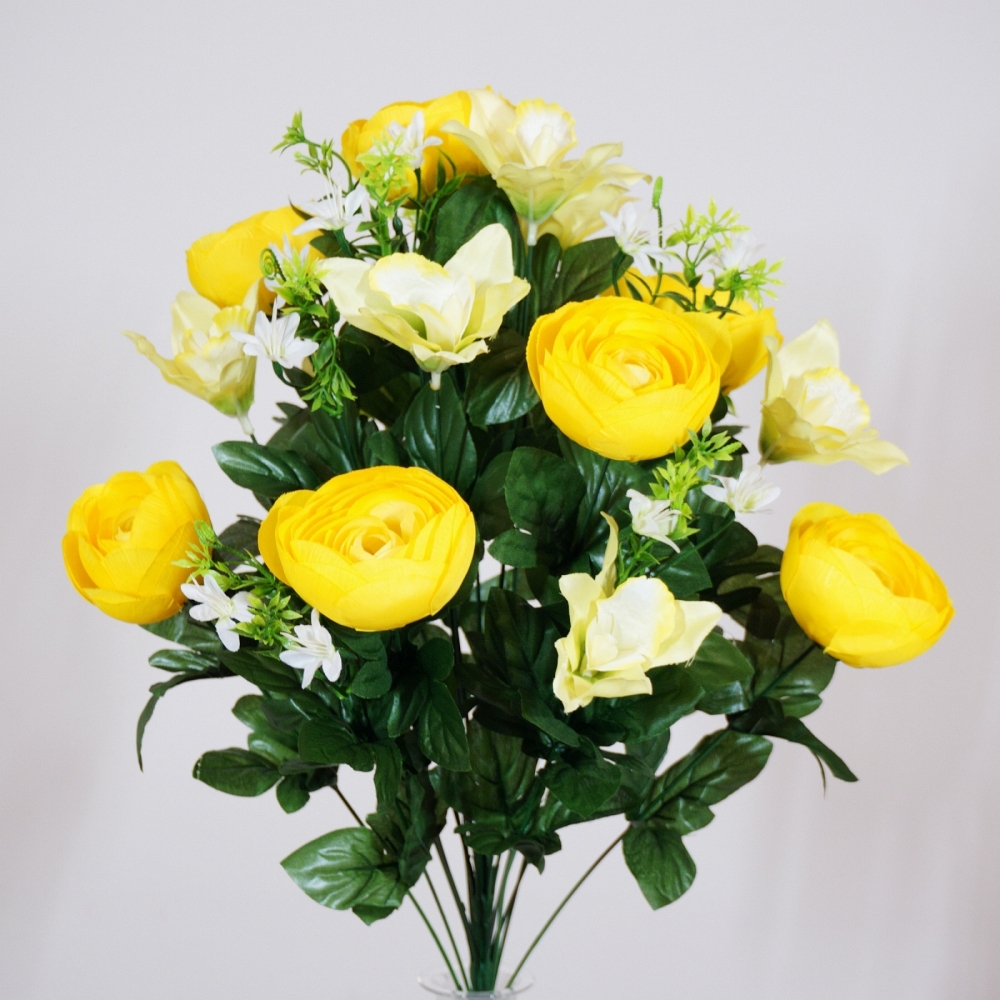 Mazzo rotondo di ranuncoli e orchidee in tonalità giallo